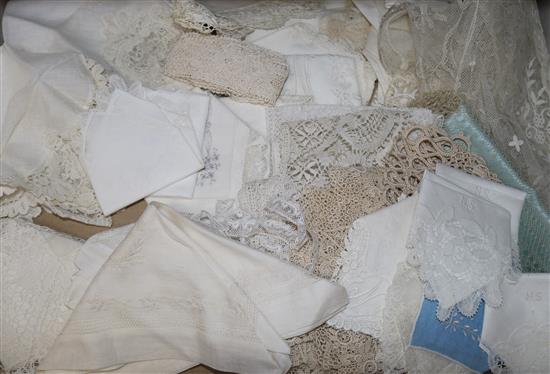 A collection of lace trimmed hankies, pair of gloves etc